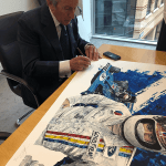 Sir Jackie Stewart signing artwork