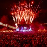 Fireworks above main stage and large crowd at Big Feastival