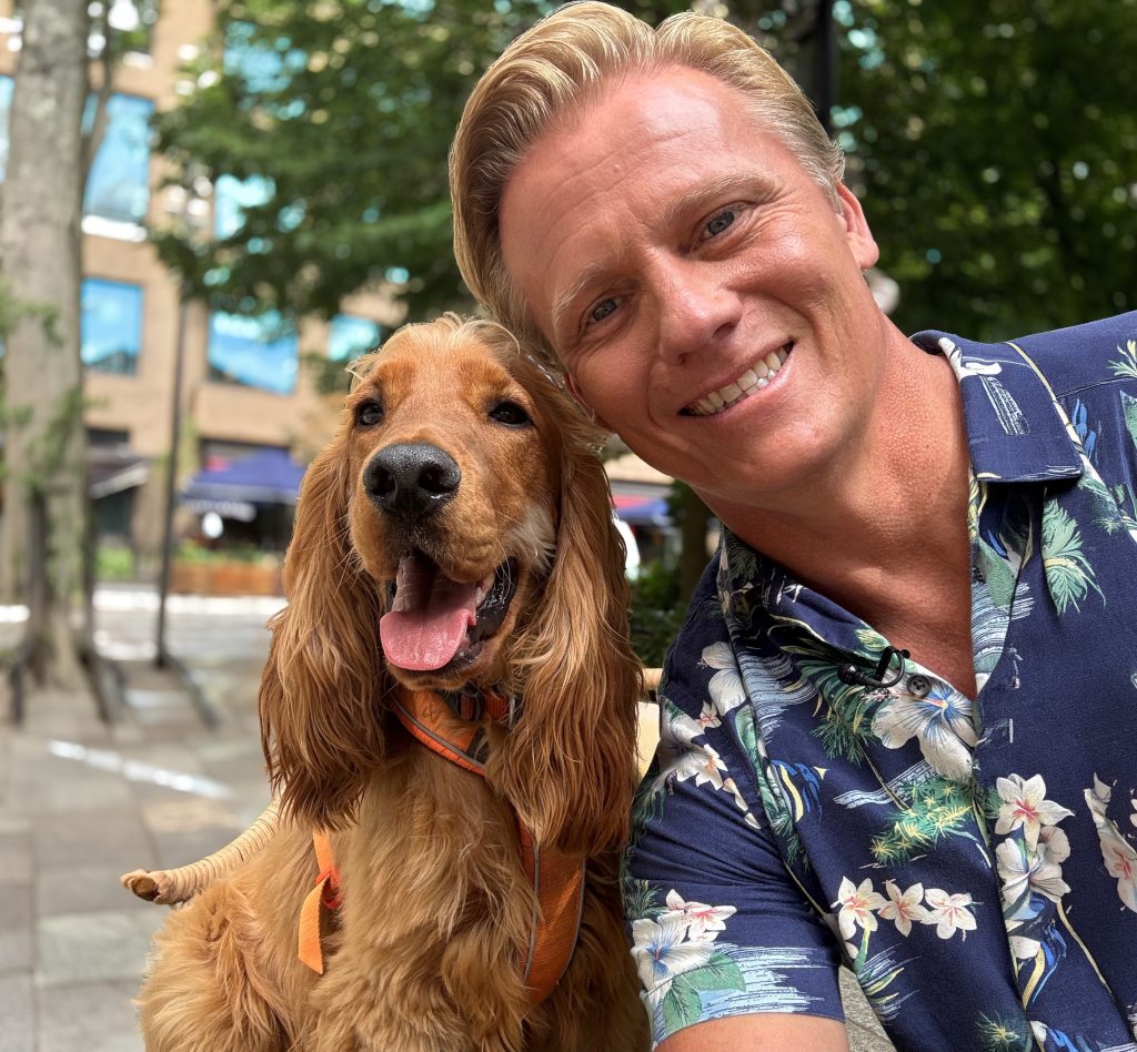 Dr Scott Miller with a dog