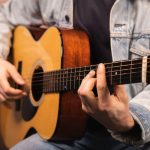 Man playing acoustic guitar