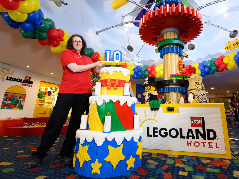 Check out this super-size LEGO cake to celebrate LEGOLAND hotel's 10th birthday & welcoming visitors for fun.