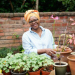 Advolly Richmond tending to plants